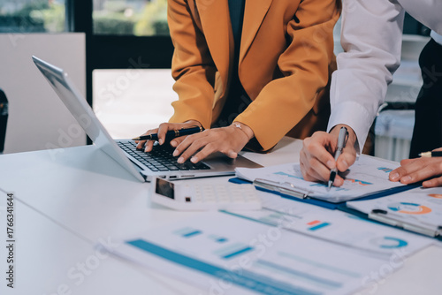 Accounting company provide finance and taxation planning for profitable cash flow, Auditor and accountant team working in office, analyze financial data and accounting record with calculator.Insight