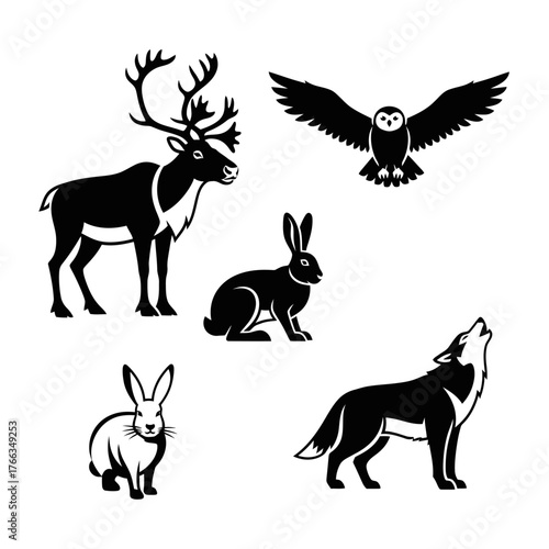 Black and white silhouettes of various wild animals including a reindeer, owl, hare, rabbit, and howling wolf.