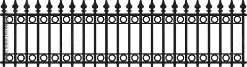 Ornate black metal fence with pointed finials and circular accents white