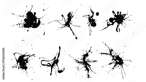 Abstract black ink splatters and stains forming organic shapes on a white background silhouette