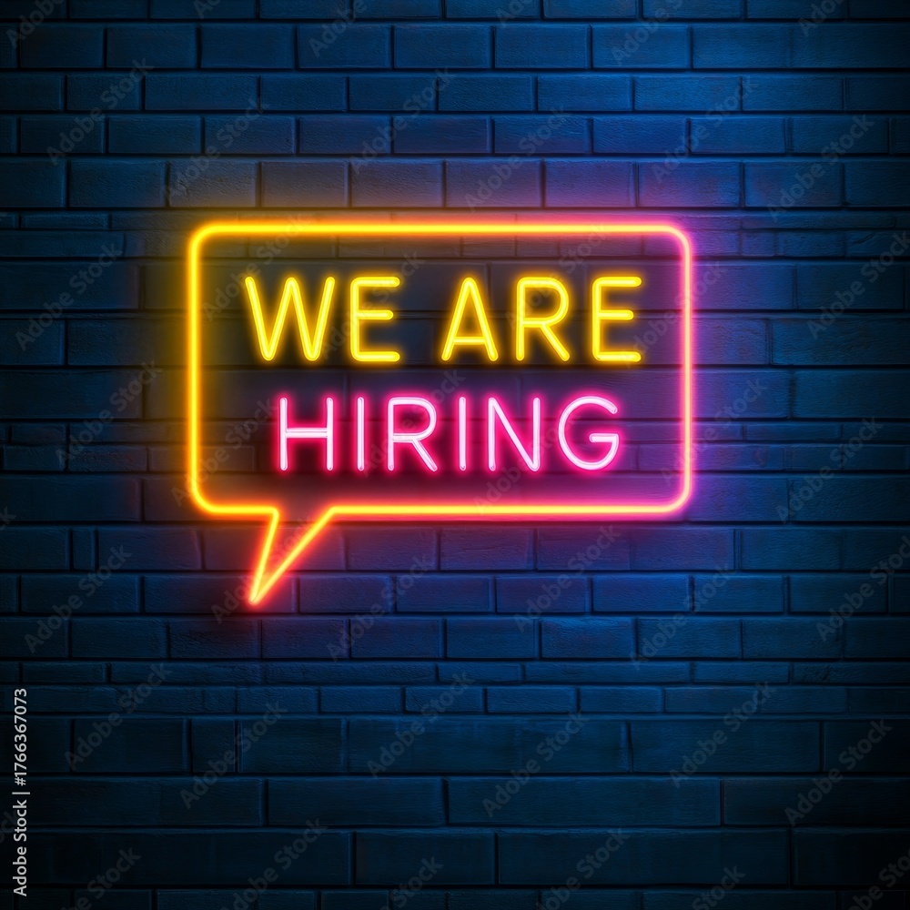 Obraz premium Bright neon 'We Are Hiring' sign illuminates a dark brick wall, signaling exciting career opportunities for ambitious professionals seeking growth and new roles.