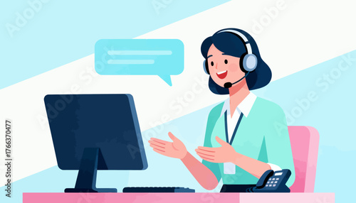 A woman is sitting at a desk with a computer and headset on. She is smiling and she is happy