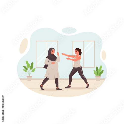 Pregnant woman in hijab exercising with trainer in a studio.