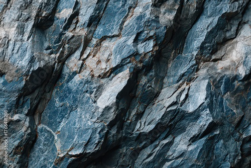 Detailed Blue and Gray Rock Texture with Natural Patterns and Metallic Shimmers at an Angle for Abstract Backgrounds and Geological Studies Optimized for Adobe Stock