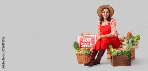Female farmer with fresh ve...