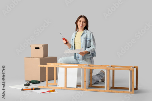 Young woman with instructio...