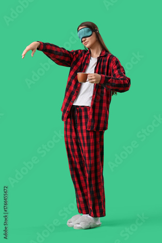 Female sleepwalker in pajam...