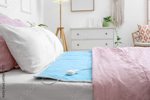 Electric heating pad on a b...