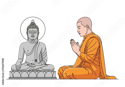 A monk prays seated before a seated Buddha statue