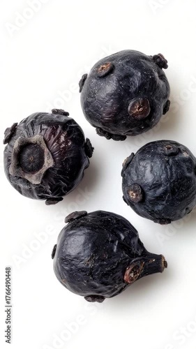 Fresh blueberries arranged on a white background