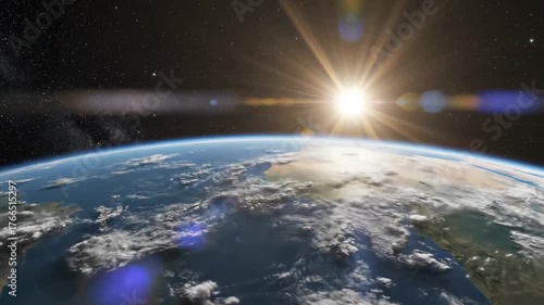 Planet Earth from space with sunburst and stars. Earth's surface and atmosphere glow