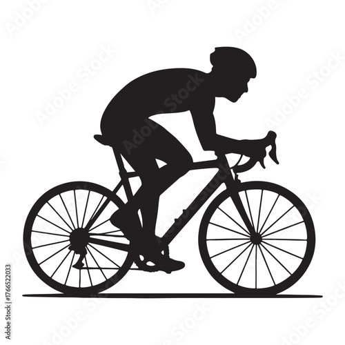 silhouette of a man riding a bicycle