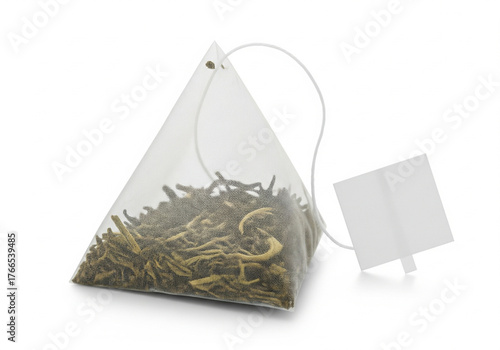 Triangle Green Tea Bag with Empty Label Isolated on White Background.