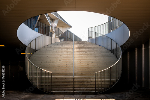 Detail of modern sustainable architecture emphasizing scandinavian design and concrete structure in an urban composition with geometry and natural daylight reflections