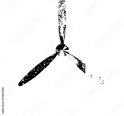 Wind turbine rotates against a clear sky