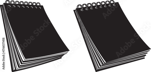 Two open spiral notebooks silhouette