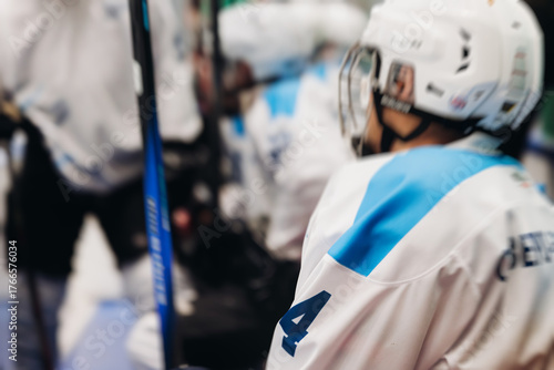 Photography Hockey match game on ice rink arena stadium, team of ice hockey professional pla