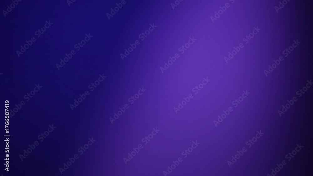 Una toma de cerca de un fondo abstracto de color azul y morado  con un degradado ligero desenfocado en movimiento. 