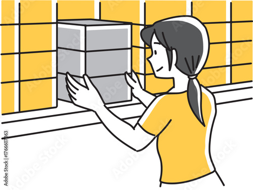 箱を引き出す女性