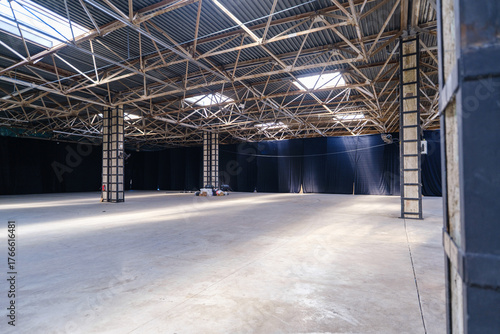 Tbilisi, Georgia - October 2 2025: Industrial Warehouse Stage Setup With Scaffolding, Lighting and Equipment for Live Events