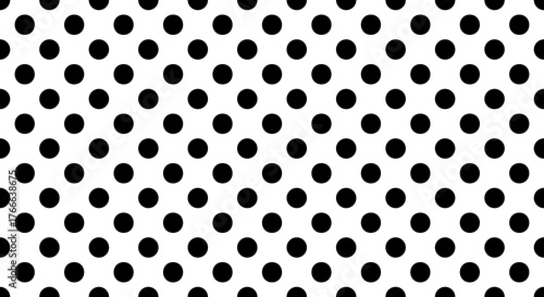 Seamless pattern of black dots on a white background, repetitive geometric design for texture or decoration
