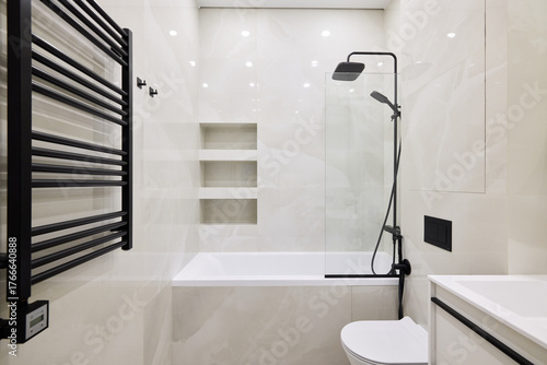 An Elegant and Modern Bathroom Design Featuring Both Shower and Bathtub for Luxury and Comfort