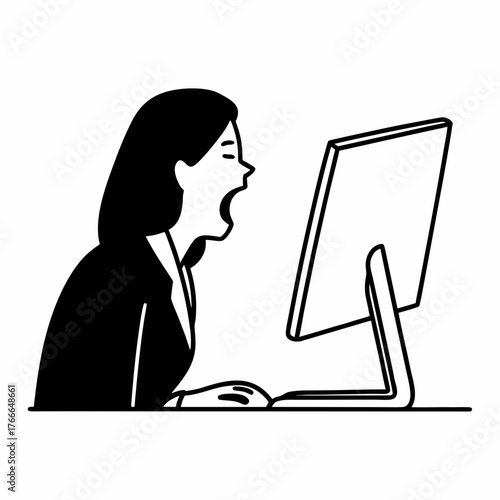 Young woman yawning while working at computer in office setting  
