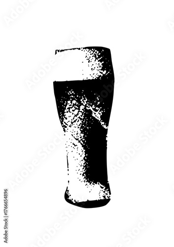 Pint glass overflows with dark liquid in a pub setting