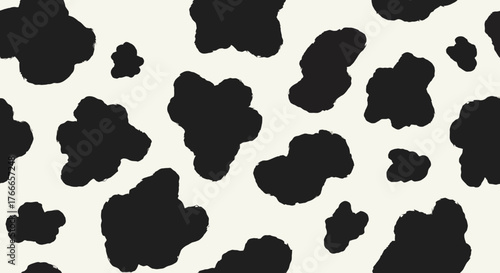 Abstract black and white cow print pattern, perfect for design and decoration
