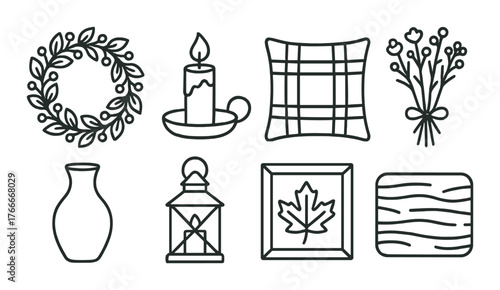 Elegant autumn decor: candle, vase, flowers, pillow, and leaf art on warm brown background