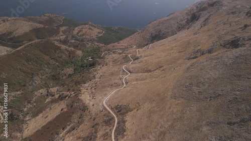 Drone view of traditional Greek road near the coast
