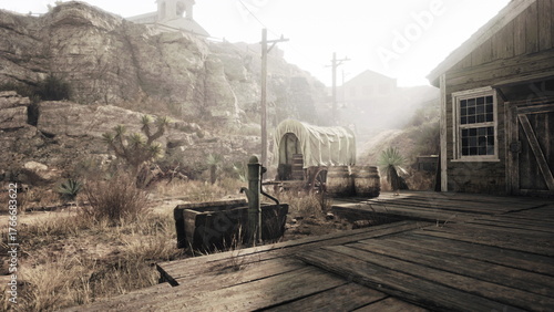 Photos A quiet abandoned town shrouded in morning fog reveals a dusty path, old wooden structures, and remnants of a wagon