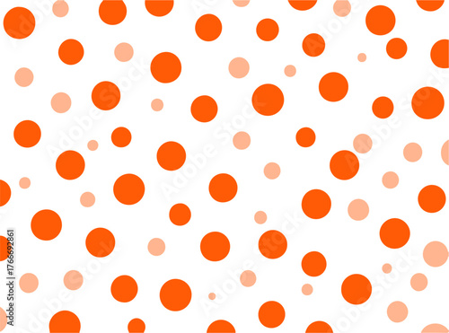 Orange and light orange polka dots on a white background, cheerful and playful pattern for design