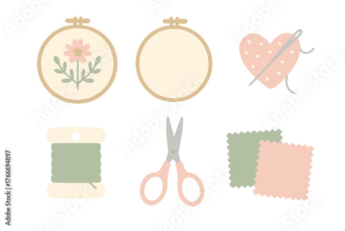 Set of embroidery and sewing tools including hoop, thread, scissors, pincushion, and fabric swatches