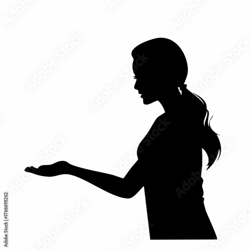 Silhouette of a woman holding out her hand.