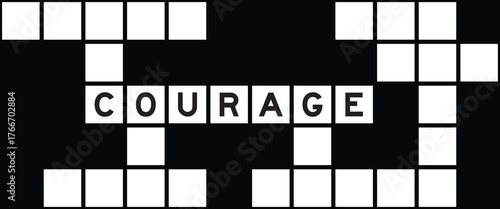 Alphabet letter in word courage on crossword puzzle background