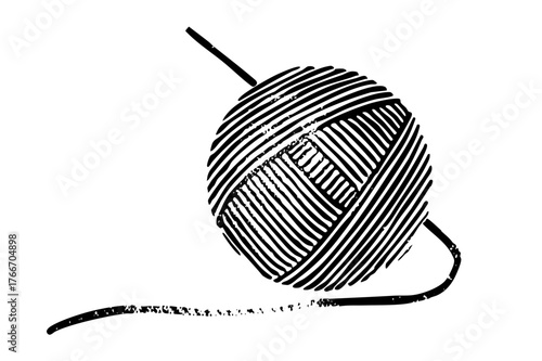 Yarn ball unravels in crafting scene