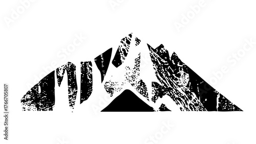 Mountains rise dramatically in a rugged landscape