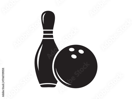 black and white bowling ball and pins
