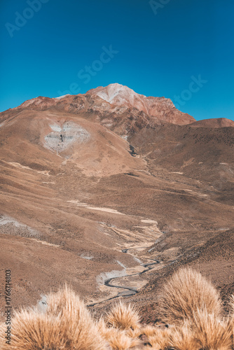 panorama of high altitude mountains with blue sky in bolivia