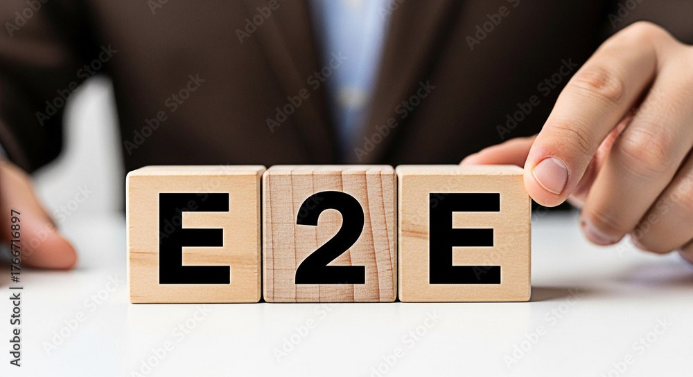 Naklejka premium Hand arranging wooden blocks spelling