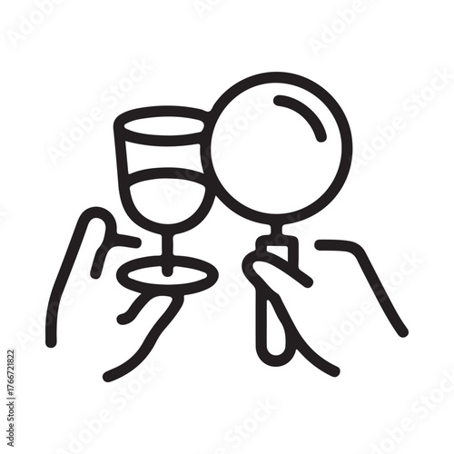 Hands holding a wine glass and a magnifying glass for inspection