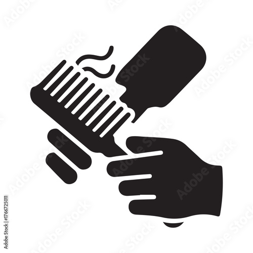 Hand applying product to hair comb for styling
