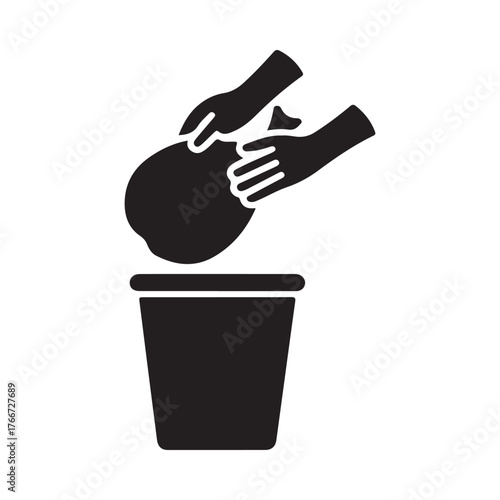 Hands tossing trash bag into bin icon symbol