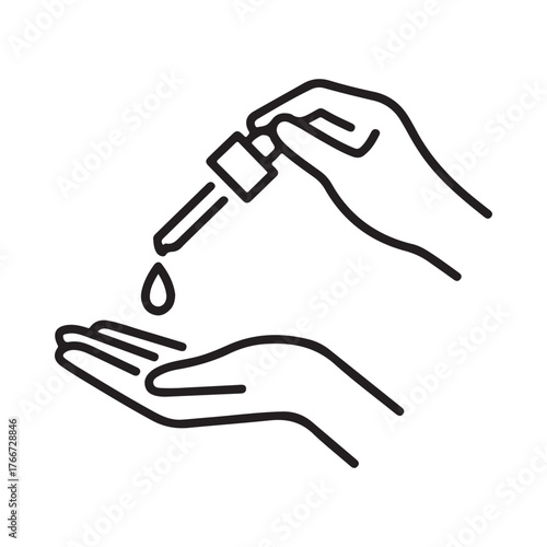 Hand applying dropper serum or essential oil to palm