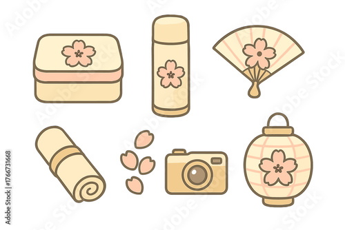 Japanese spring picnic items decorated with cherry blossom flowers and petals