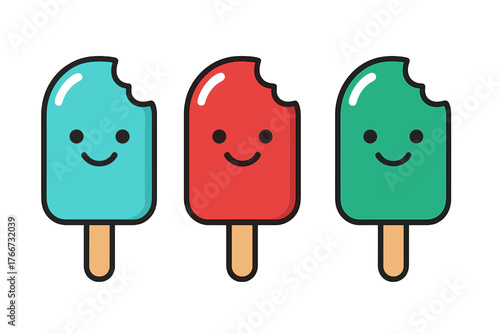 Three colorful smiling popsicles with bites taken out displayed on wooden sticks