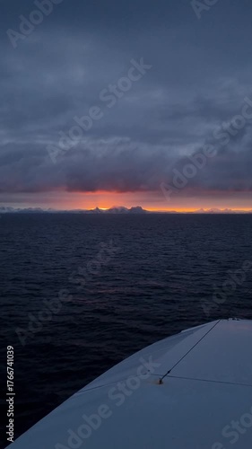 Wallpaper Mural Impressive journeys. Norwegian Fjord Sunset Cruise. Cinematic pink sunset in snowy mountain. Scenic view of Norwegian arctic sea surrounded by fjord covered with snow, ice. Travel concept.
 Torontodigital.ca