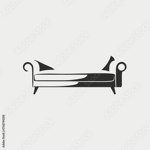 A stylized illustration of a chaise lounge with decorative armrests and pillows.