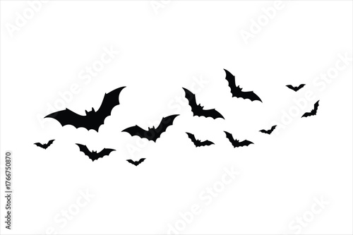 Spooky flock of silhouetted bats flying in formation for halloween and horror themes